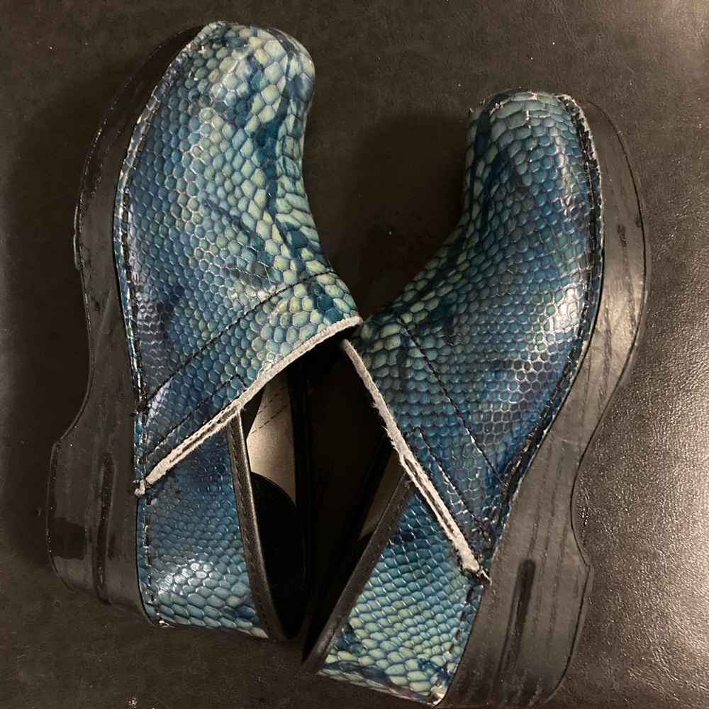 Size 37 dansko clogs. Worn at front (in pic)